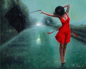Γυναίκα με ομπρέλα στην βροχή